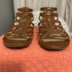 Sandals with gold accents